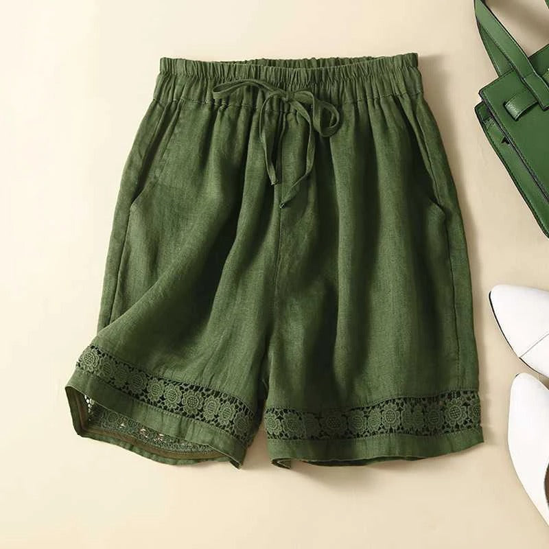 Stylish women's floral print shorts with a comfortable elastic waist, a must-have for spring & summer fashion.