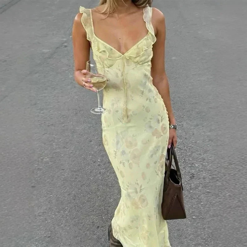 Women's casual floral sleeveless backless dress, perfect for a stylish beach day or summer vacation.