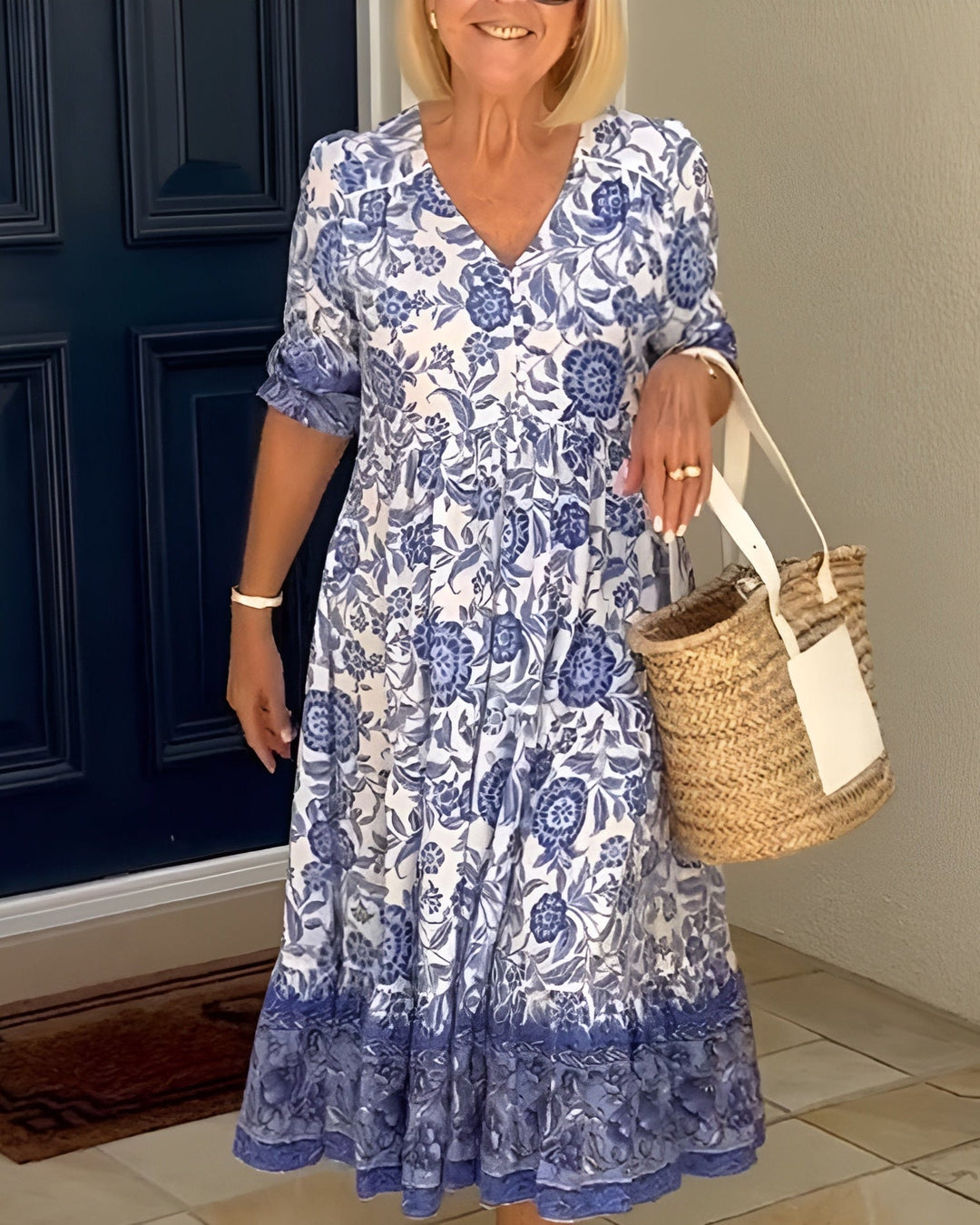 Women's floral V-neck A-line midi dress, perfect for effortless spring and summer style. Flowy and elegant.