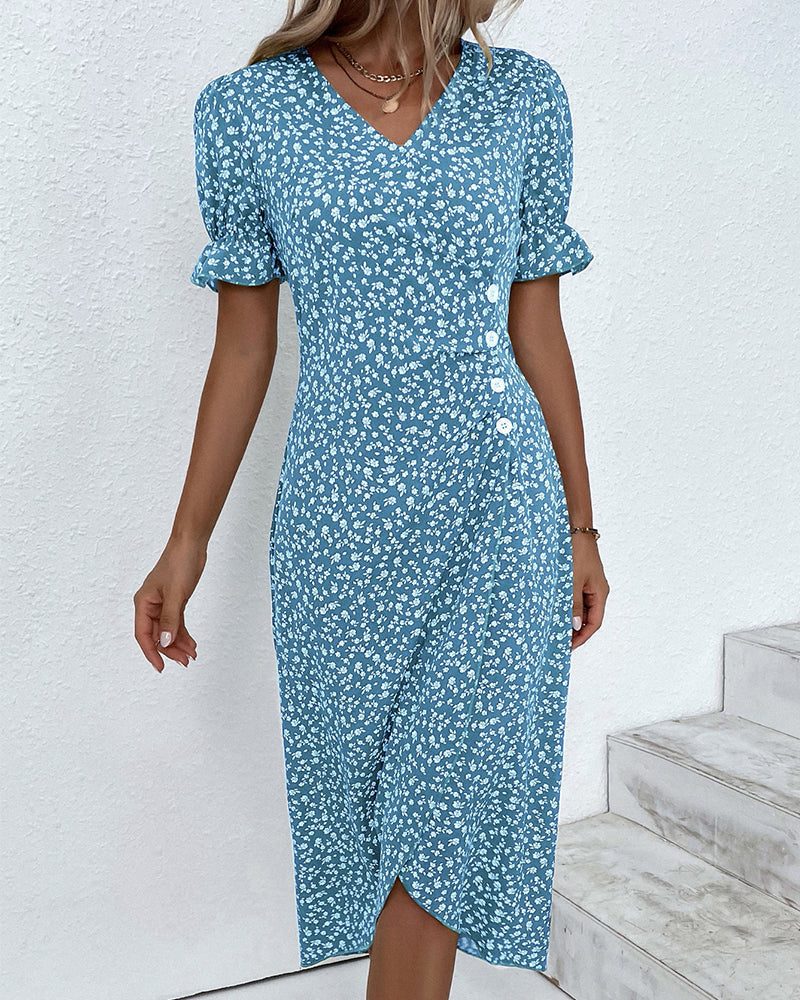 Side profile of a women's floral V-neck flowy maxi dress, highlighting its beautiful drape.