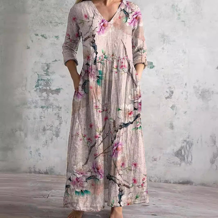Relaxed fit women's floral maxi dress with V-neck, ideal for effortless everyday summer style.