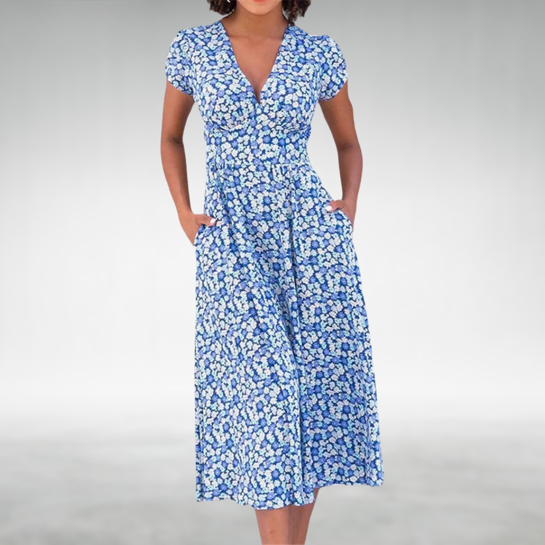 Women's floral V-neck midi dress with pockets, perfect for a casual summer day.
