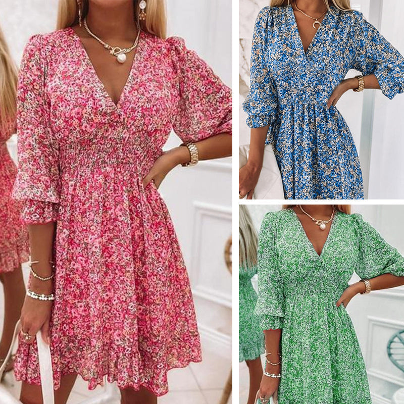 Women's floral V-neck mini dress with puff sleeves, perfect for summer casual wear.