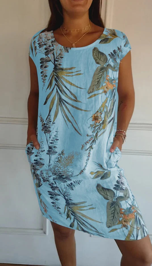 Stylish women's printed round neck dress. Knee-length & comfortable loose fit, great for casual elegance.