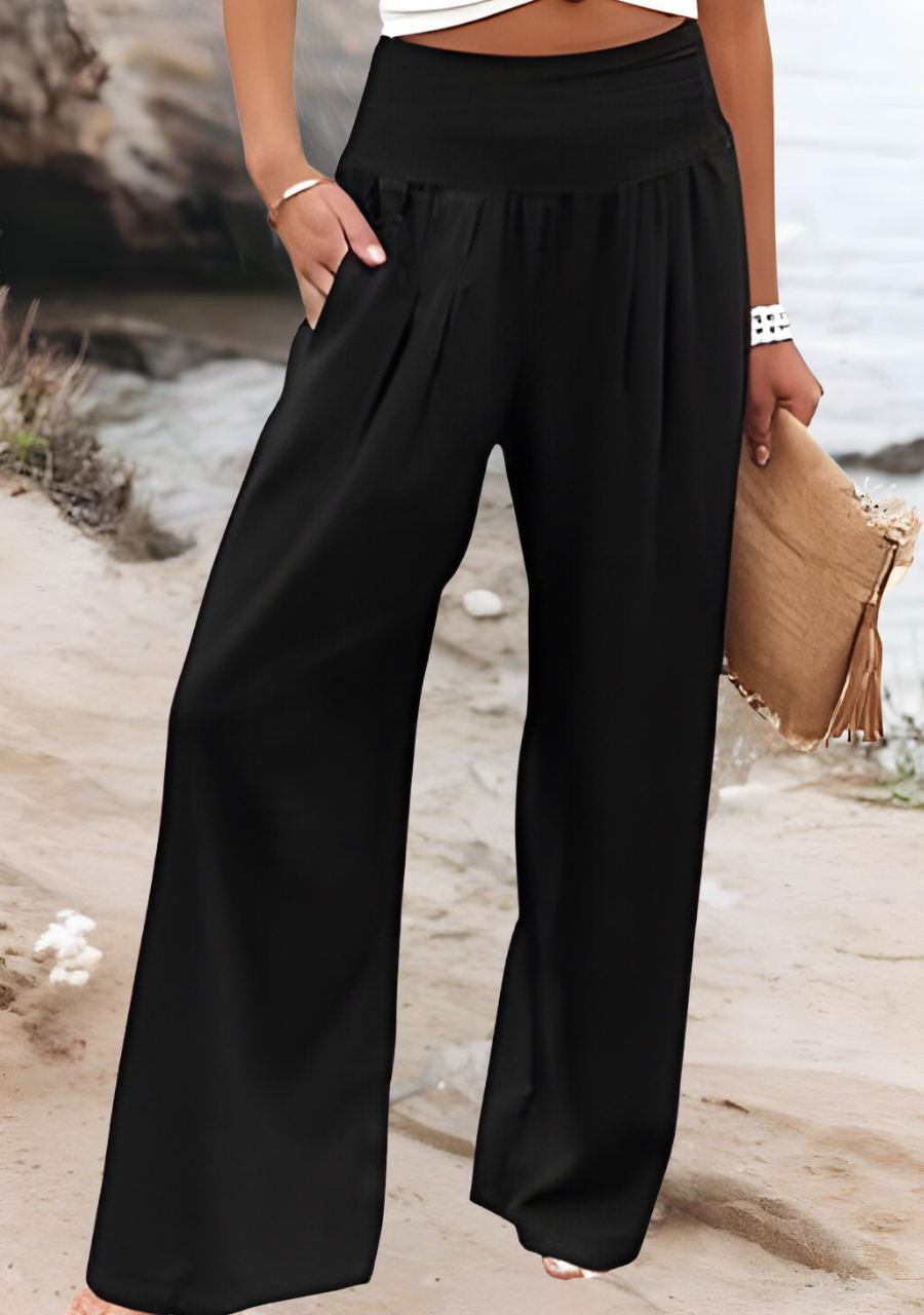 Breezy women's wide leg flowy pants with elastic waist, ideal for comfortable summer beach days & stylish resort wear.