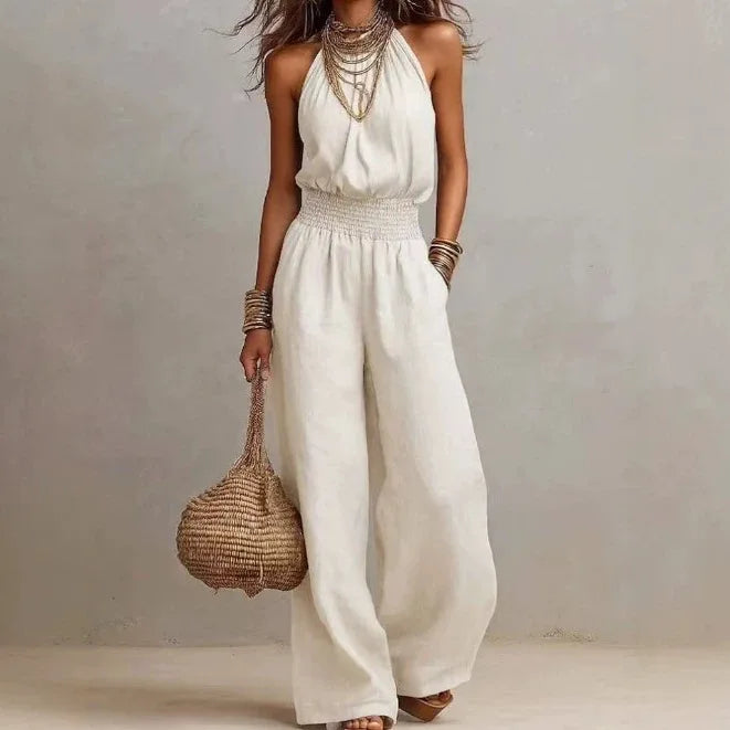 Chic women's wide leg halter jumpsuit, ideal one-piece vacation outfit for comfortable summer fashion.