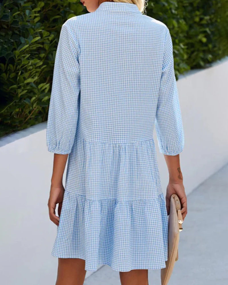 Lightweight women's flowy A-line summer dress with a chic check pattern, ideal for effortless casual fashion.