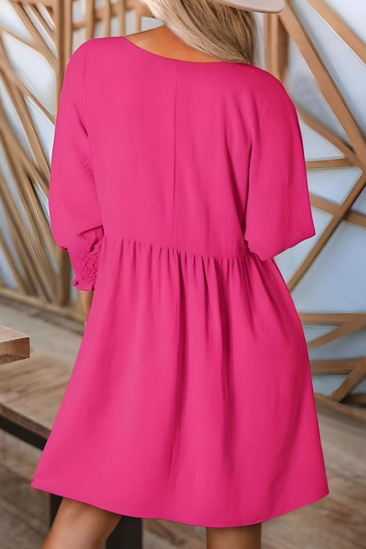 Smocked cuff flowy babydoll mini dress for women. Half-sleeve casual summer style, comfortable & stylish.
