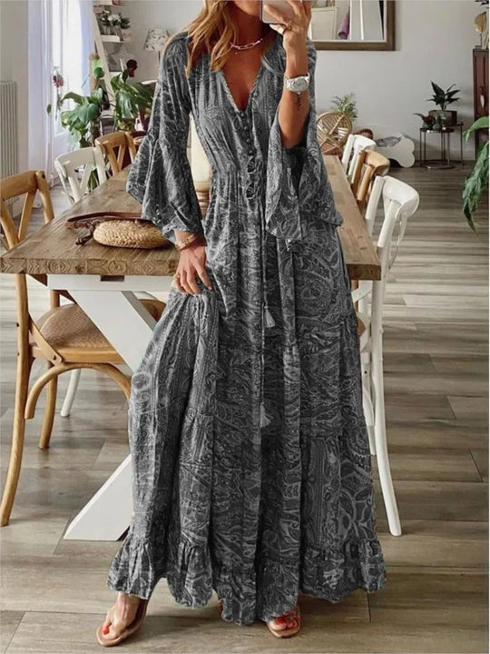 Colorful women's flowy boho maxi dress, versatile for summer outings, beach trips, and relaxed vacation style.