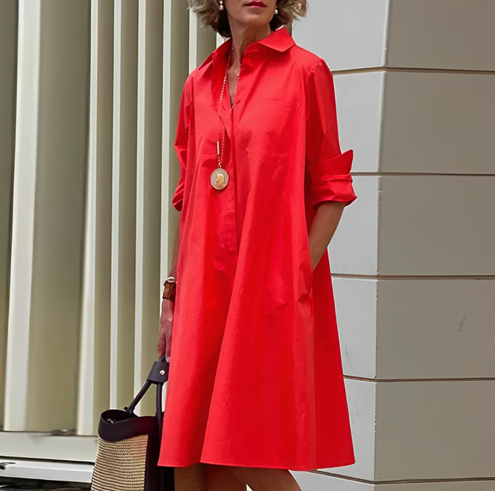 Women's flowy button shirt midi dress. Versatile day to night style perfect for work, casual outings, or elegant events.