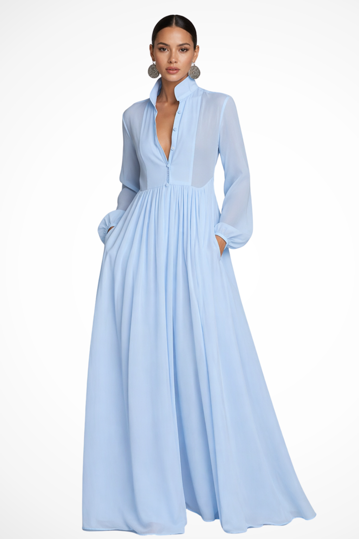 Women's flowy long sleeve button-front maxi dress with practical pockets, ideal for spring & summer.