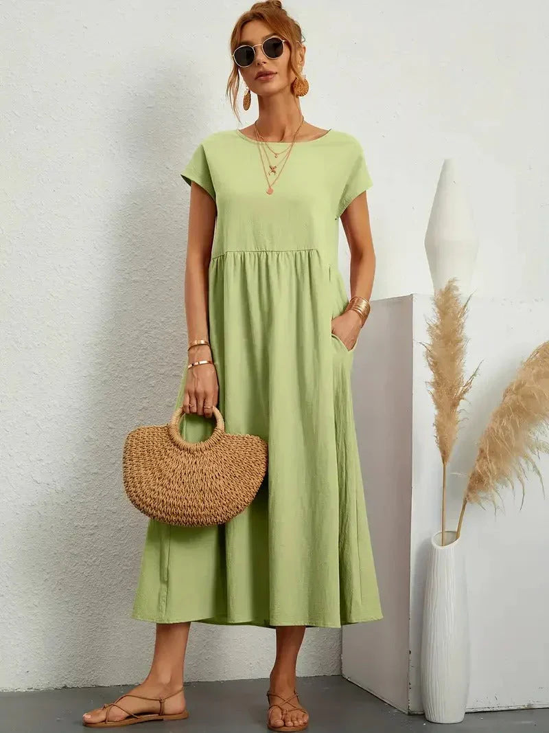Extremely comfortable women's flowy maxi dress with pockets, short sleeves & loose fit for ultimate relaxation.