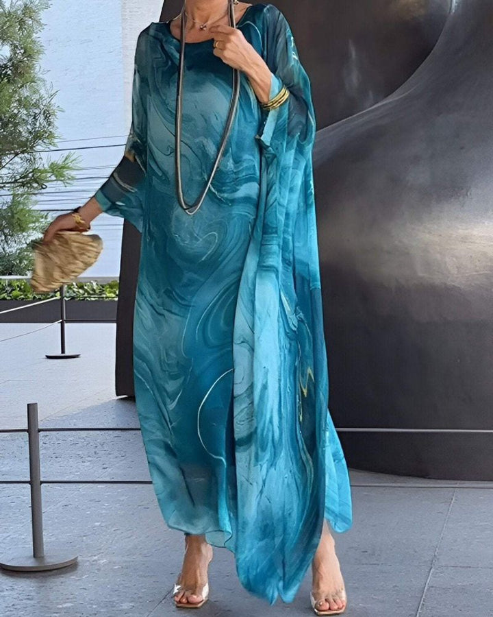 Women's flowy midi dress with tummy coverage, flattering design for summer casual wear. Comfortable & elegant.