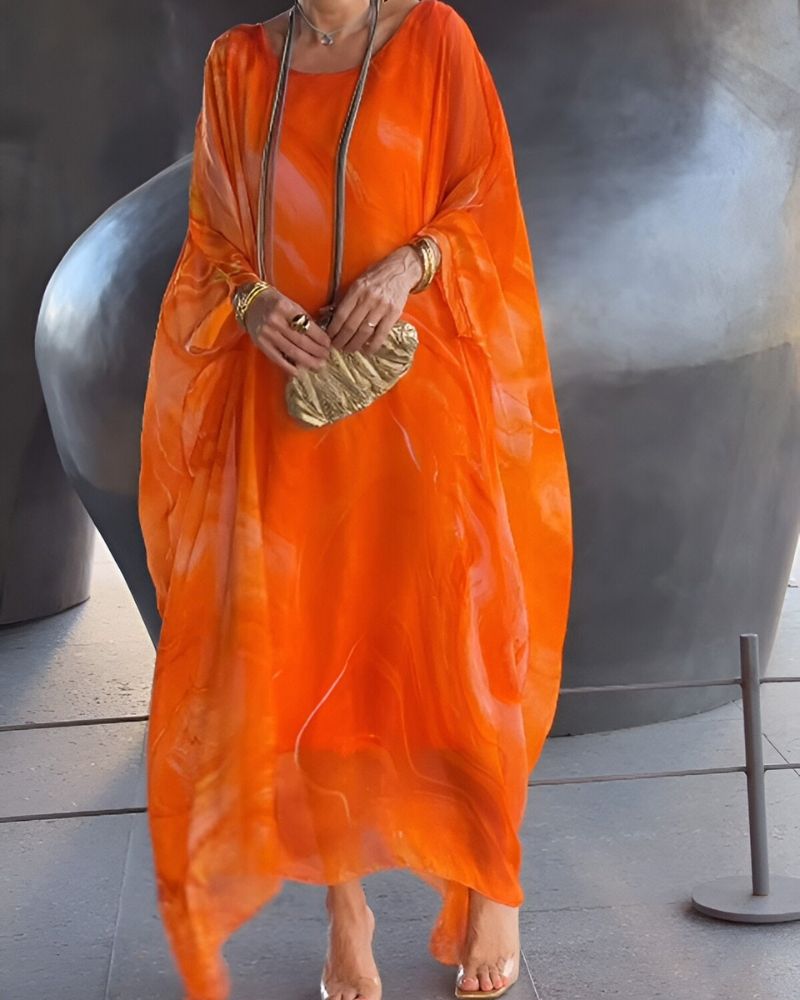 Soft flowy women's midi dress, offers flattering tummy coverage for ultimate comfort and elegant everyday style.
