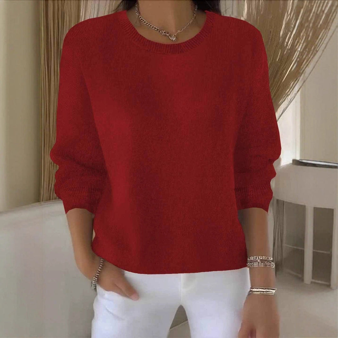 Women's Flowy Relaxed Fit Sweater. Versatile casual chic top for everyday fashion.
