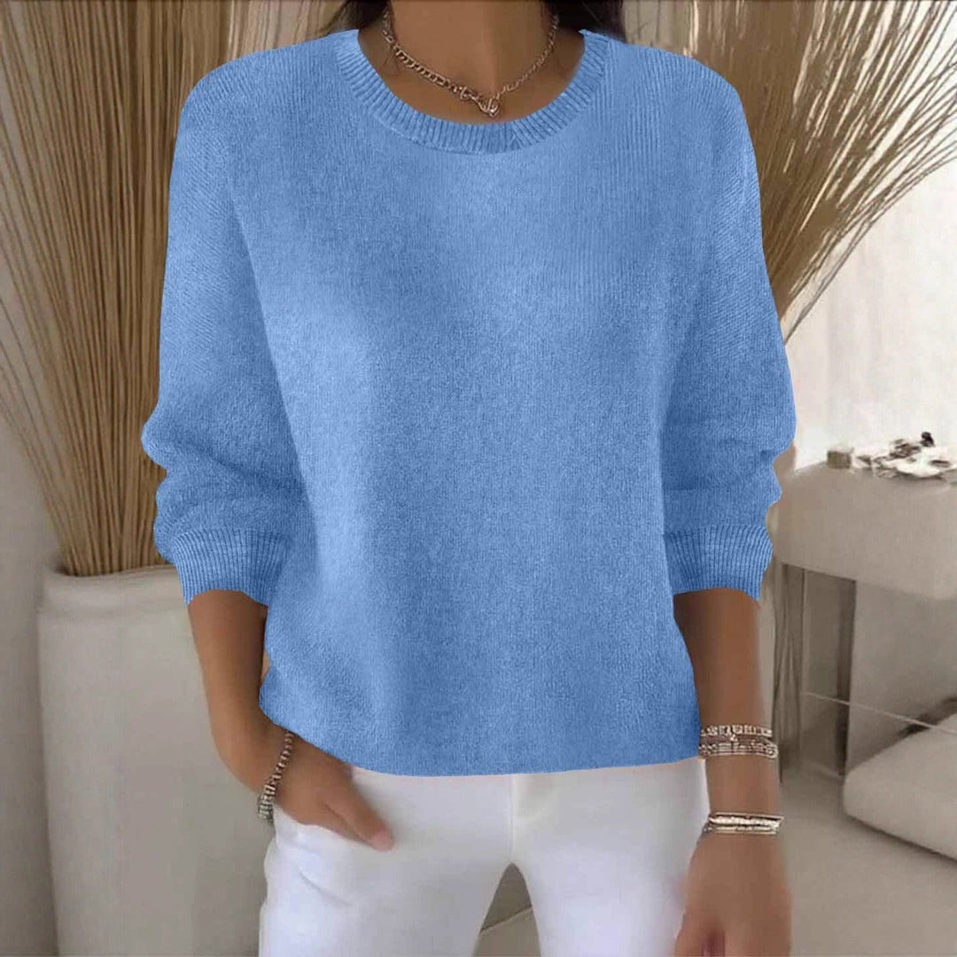 Stylish women's flowy relaxed fit sweater, a versatile casual chic pullover for ladies' comfort.