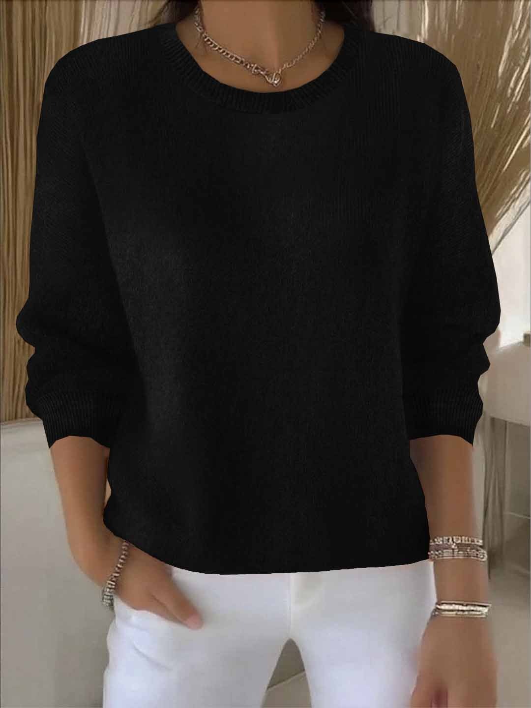 Long sleeve flowy relaxed fit sweater for women. A comfortable casual chic top for versatile wear.