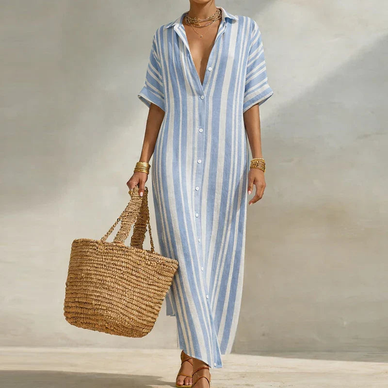 Elegant women's flowy striped long summer dress with a relaxed fit, V-neck, and three-quarter sleeves.