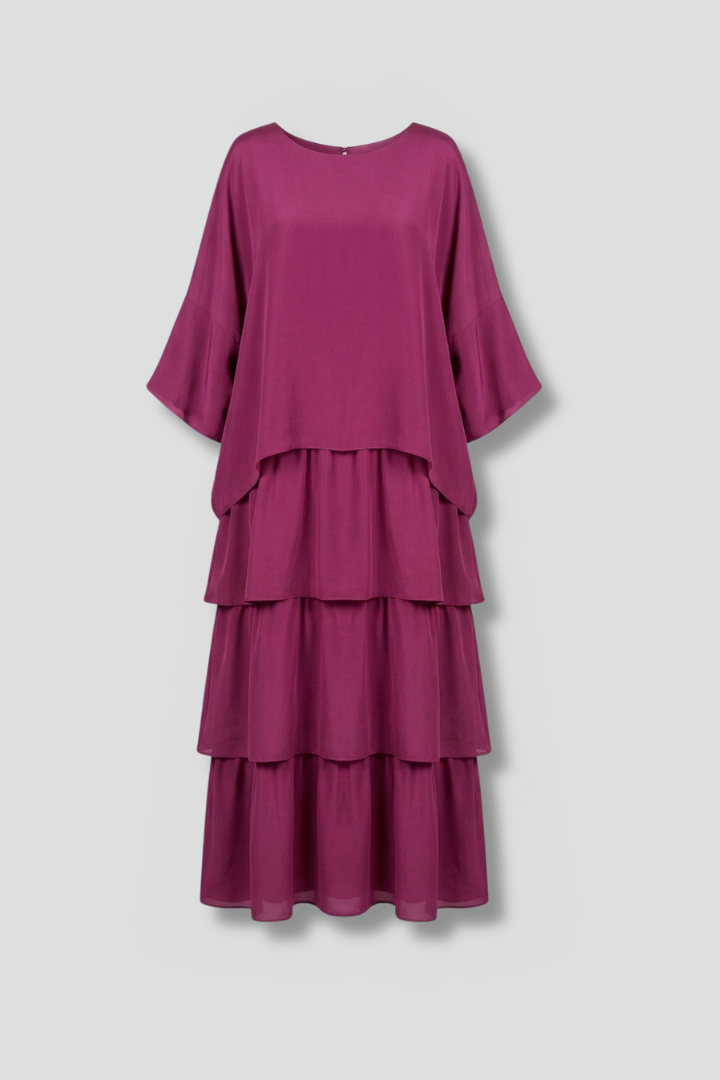 Women's flowy tiered maxi dress with round neck and relaxed fit, perfect for casual summer elegance.
