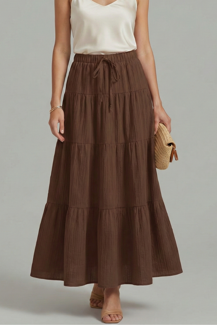 Elegant women's flowy tiered maxi skirt. Long & comfortable with an elastic waist for a graceful silhouette.