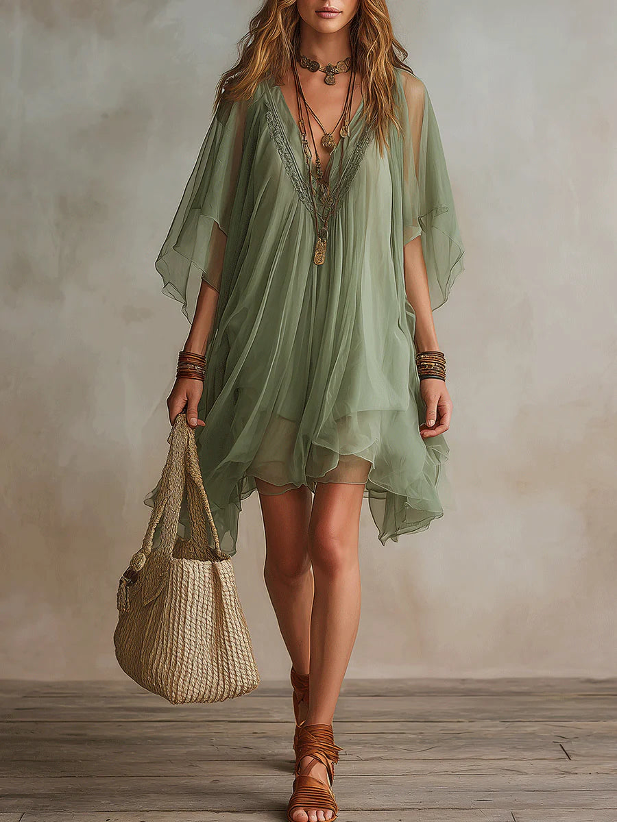 Women's flowy V-neck layered mini dress, perfect for casual summer days or a beach outfit.