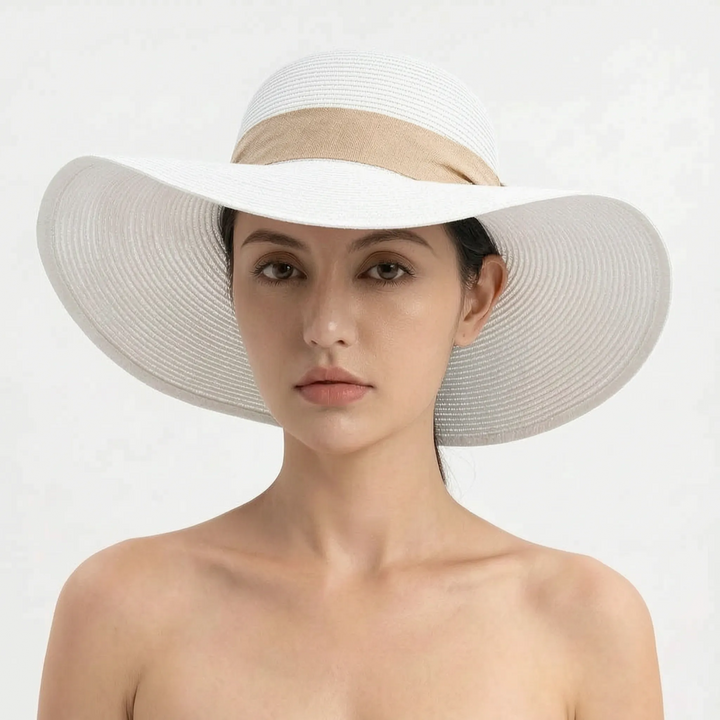 Packable women's wide brim sun hat. Foldable for travel, offering great sun protection for summer beach vacation.
