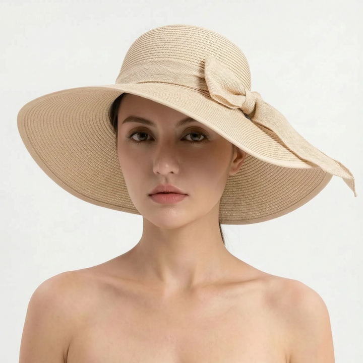 Versatile women's foldable wide brim sun hat. Essential travel accessory for beach, resort, and summer style.