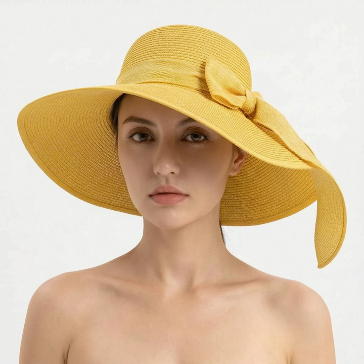 Vacation essential: Women's foldable wide brim sun hat. Perfect travel accessory for beach days & summer style.