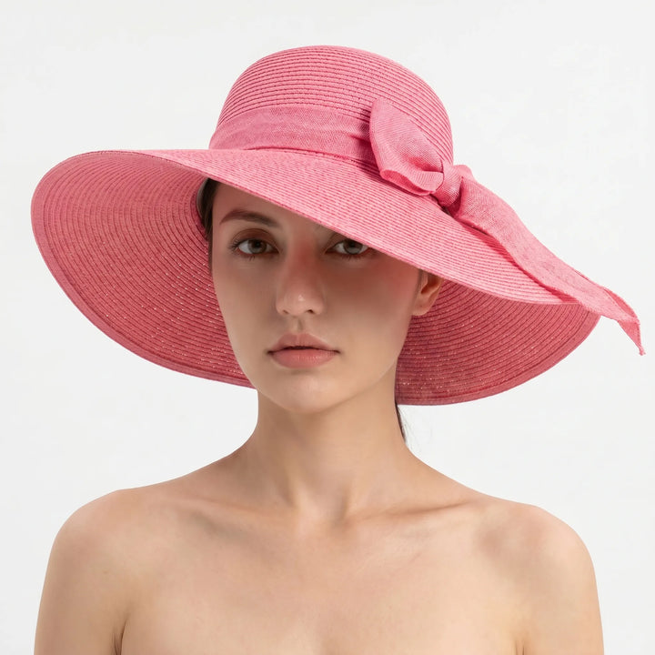 Women's wide brim sun hat, foldable for easy travel. A must-have summer beachwear and vacation accessory.