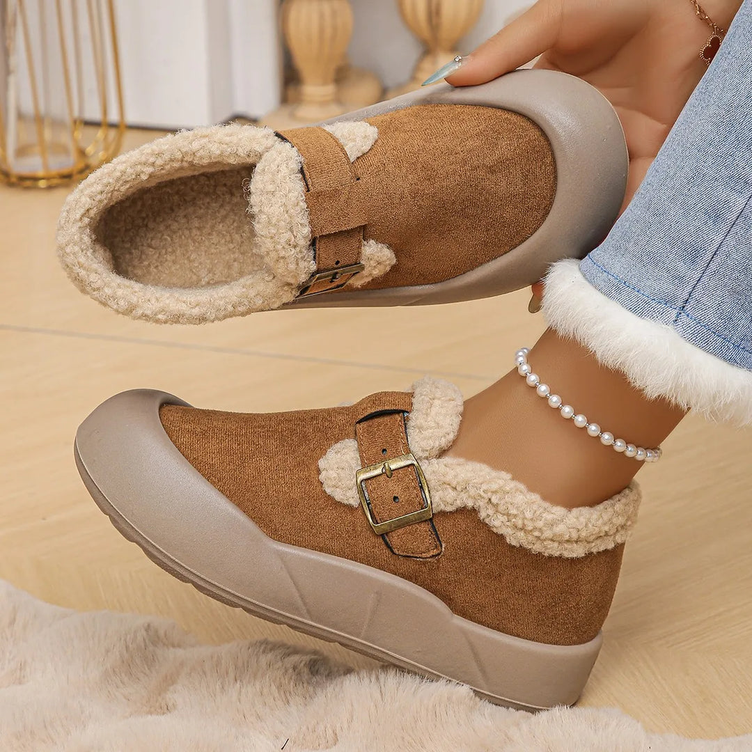 Women's cozy black leather mules with buckle, fleece lining, soft and comfortable for daily wear.