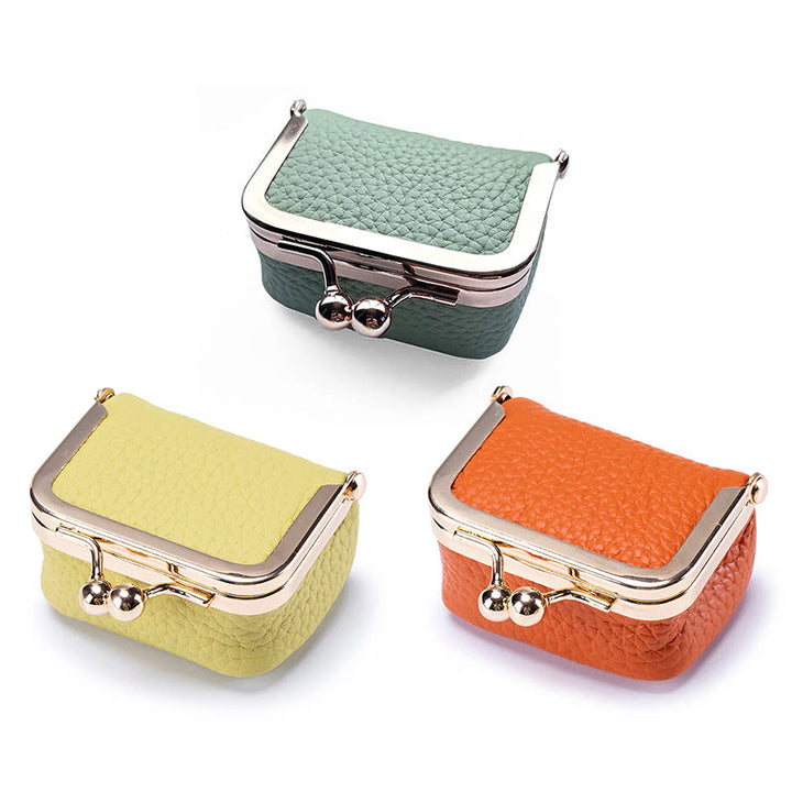 Women's genuine leather mini jewelry organizer, ideal for travel, keeping rings and earrings safe.