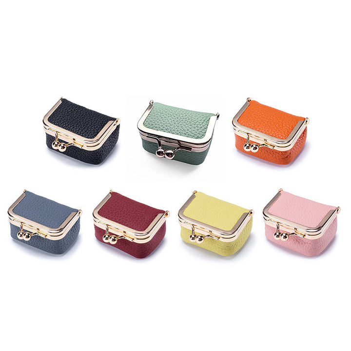 Genuine leather mini jewelry box in a neutral color, women's portable organizer for travel accessories.