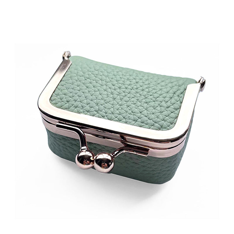 Women's mini leather jewelry travel case, perfect for organizing rings, earrings, and necklaces with ease.