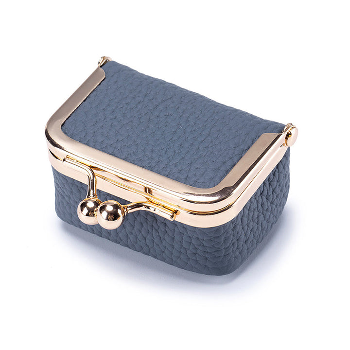 Small genuine leather jewelry box, a chic and portable organizer for women's travel accessories.