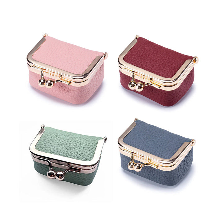 Elegant mini travel jewelry box, genuine leather craftsmanship for women's ring and earring storage.