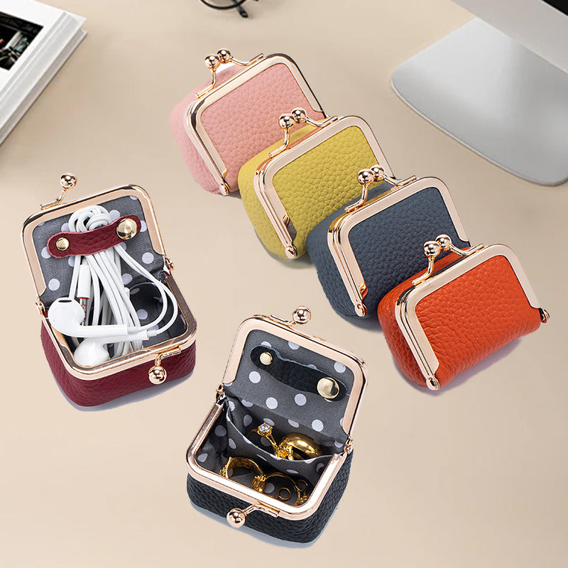 Mini genuine leather travel jewelry box for women, compact and stylish, perfect for organizing rings and earrings.