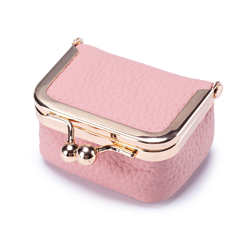 Miniature genuine leather jewelry box for women, perfect for keeping rings, earrings, and small accessories secure.