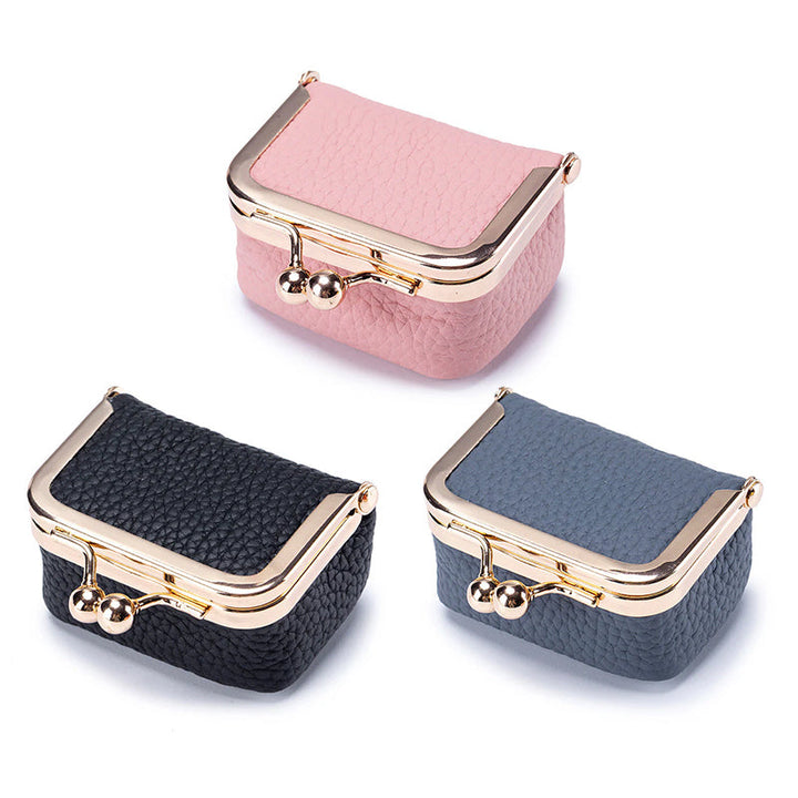 Compact genuine leather mini jewelry box, a stylish and functional travel organizer for women's accessories.