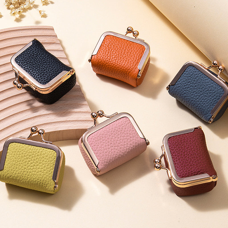 Portable leather jewelry organizer, mini size for travel, ideal for women's necklaces, rings, and small accessories.