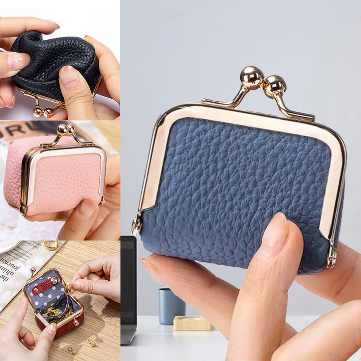 Genuine leather mini jewelry box for women, stylish and portable, keeps your travel accessories organized.