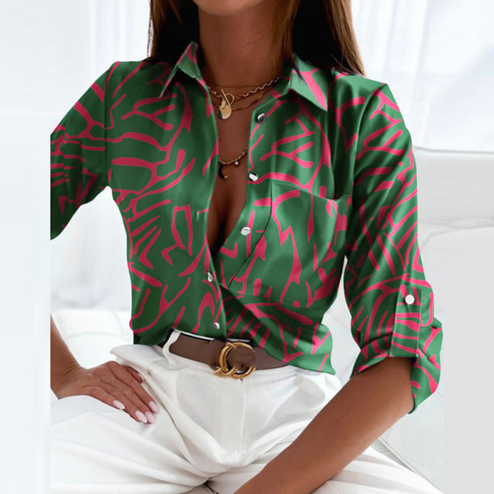 Fashionable women's long sleeve geometric print button-down blouse, versatile for elegant and casual chic.