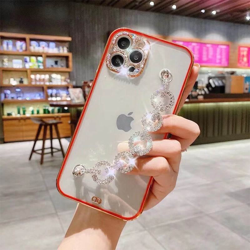 Soft TPU women's phone case featuring a glamorous rhinestone bracelet for iPhone