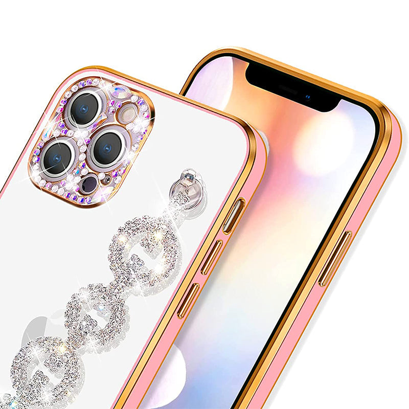 Top-down view of a sparkly women's phone case and its dazzling rhinestone bracelet