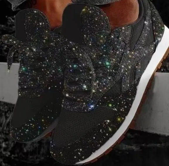 Women's glitter trainers. Lace-up fashion sneakers for everyday wear. Sparkle casual footwear.