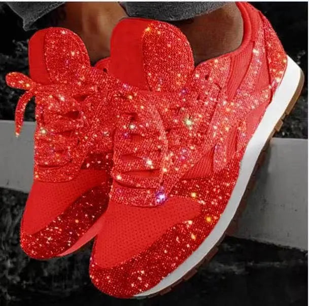 Fashionable women's glitter lace-up sneakers, offering comfortable everyday sparkle and style.
