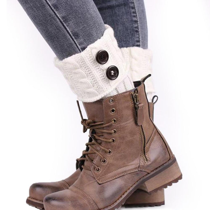 Outdoor shot of women's knit boot toppers keeping legs warm, stylish winter accessory