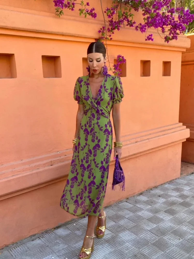 Elegant floral print maxi dress with a wrap V-neck, versatile for women's day-to-night summer wear.