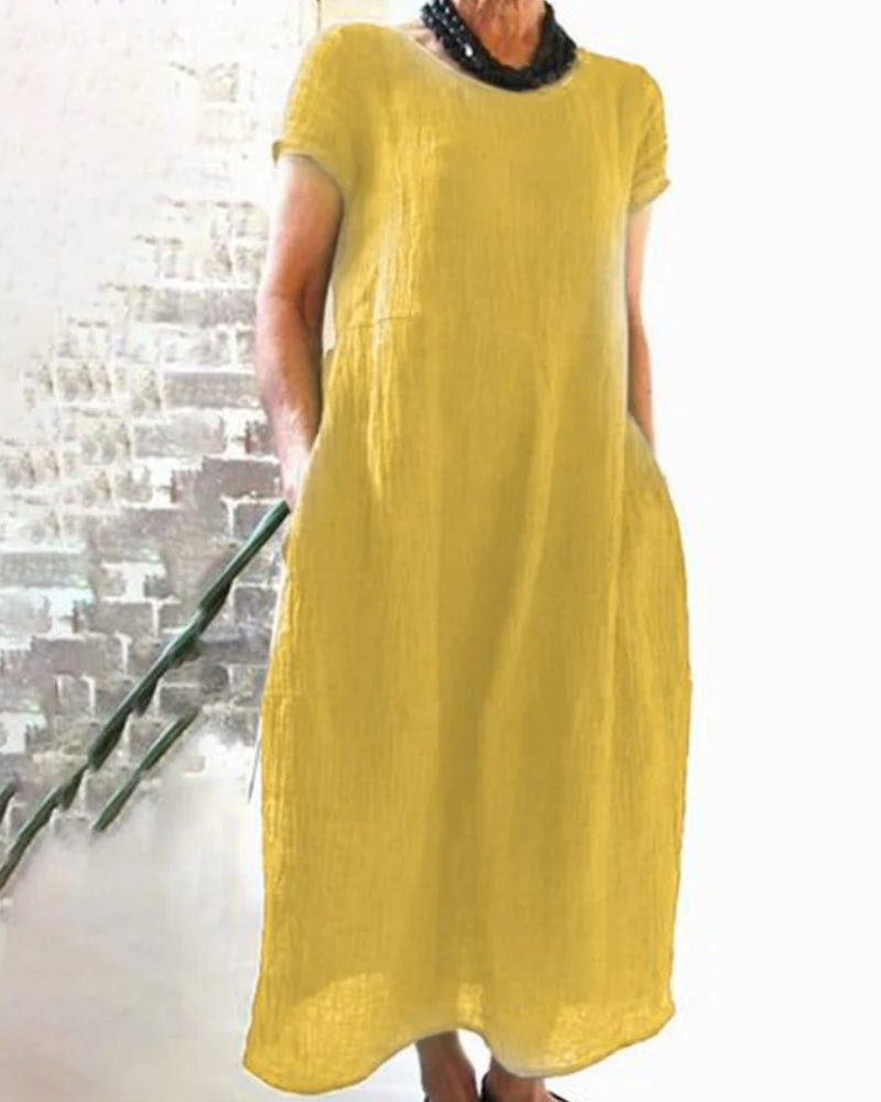Stylish women's casual midi dress in a loose fit, ideal for versatile spring, summer, and fall outfits.