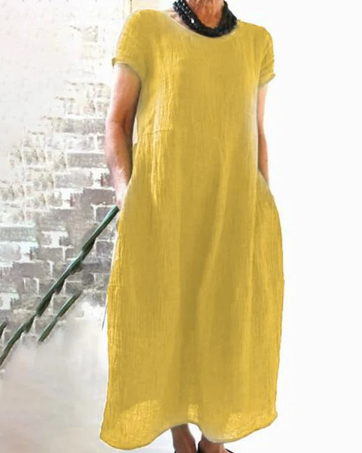 Stylish women's casual midi dress in a loose fit, ideal for versatile spring, summer, and fall outfits.