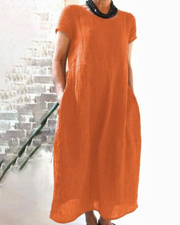 Effortless women's loose fit midi dress, a comfortable o-neck design for versatile casual fashion.